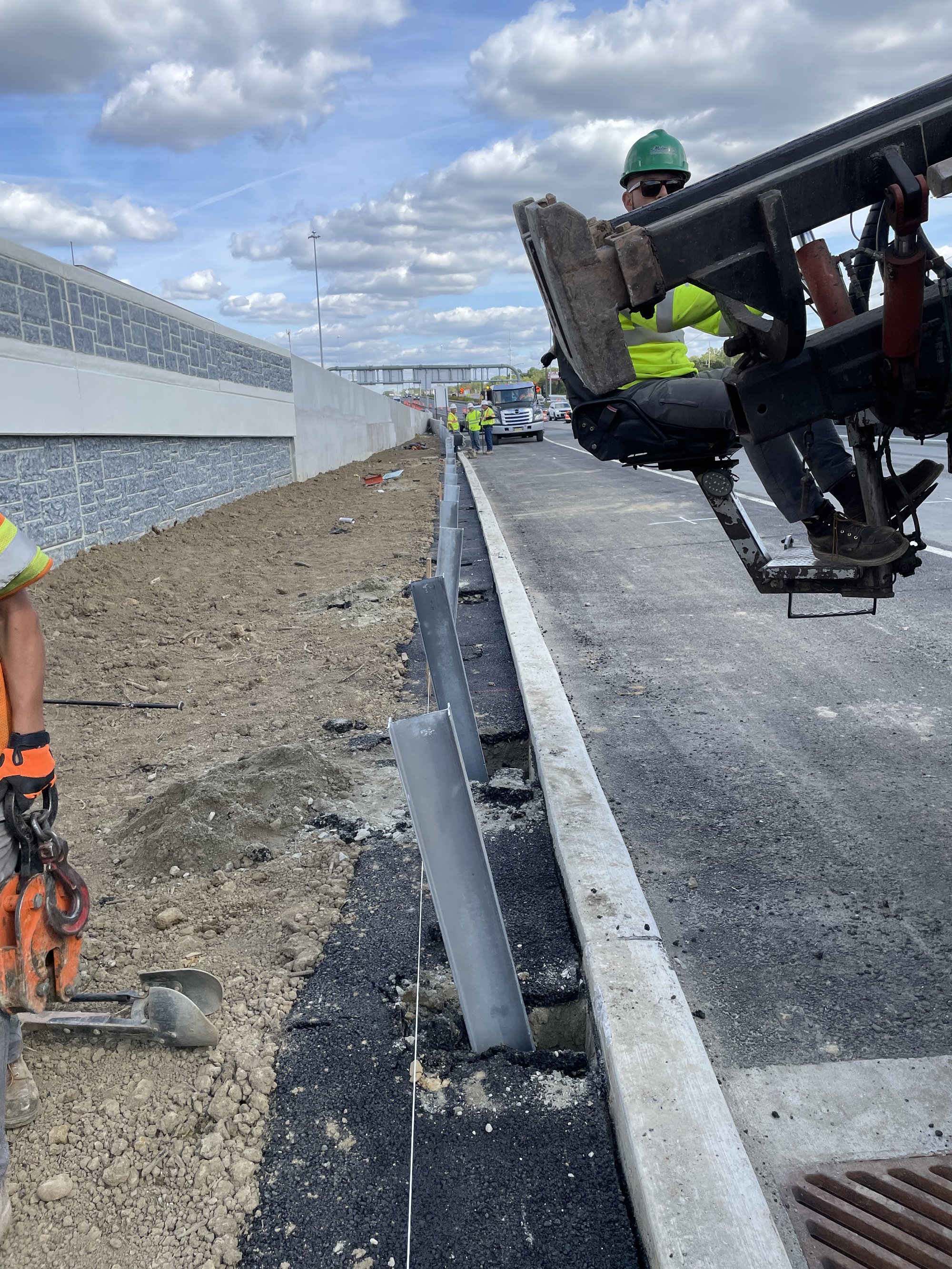 Road Safety Systems crew operating equipment on a field installation